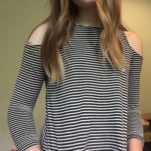 Black and white striped shirt, shoulder cut out
